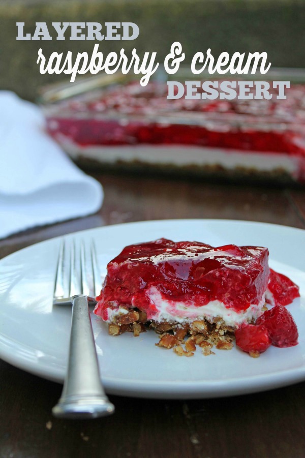 Layered Raspberry & Cream Dessert -- 30 years ago, this was called Raspberry Surprise. We've subbed in real whipping cream and cut some sugar. Perfect for a party, potluck, or picnic!