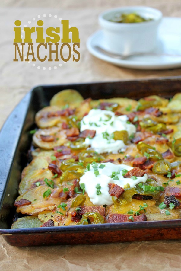 Irish Nachos -- A simple twist on the traditional nacho. Potatoes + bacon + nacho toppings. Delicious!