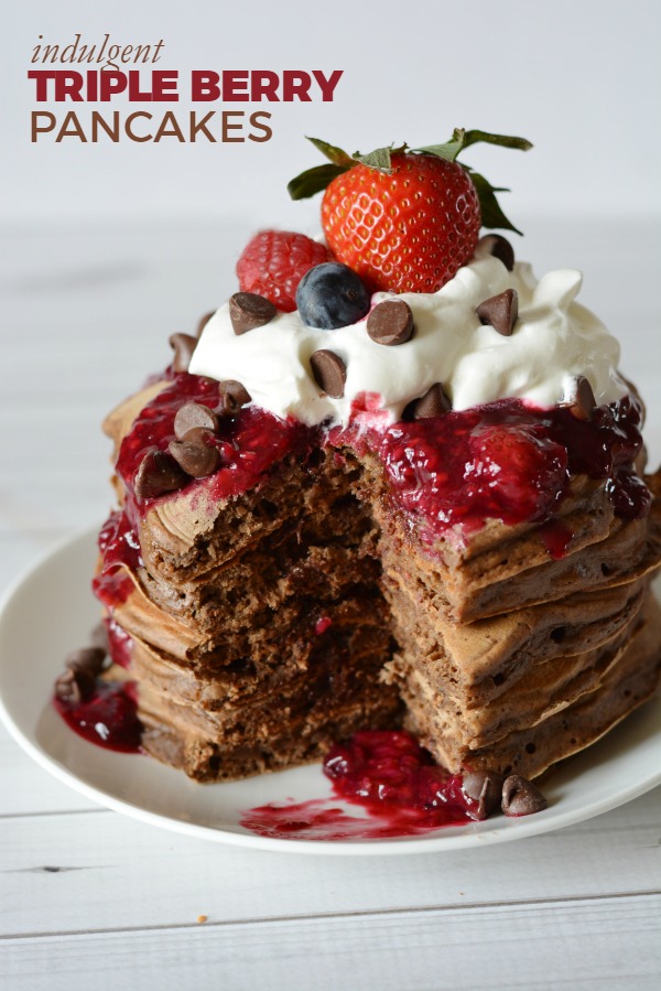 Indulgent Triple Berry Chocolate Pancake recipe -- Dessert for breakfast? Yes, please! Surprise someone with this crazy delicious pancake recipe!